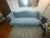 Vintage 1980s era camelback sofa, upholstered in a gorgeous light blue velvet silk fabric. Down filled, this sofa provides...