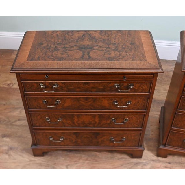 Elegant pair of Georgian style burr walnut bachelor’s chests Each chest features a beautifully figured burr walnut top...