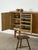Danish Mid-Century Modern sideboard in oak and brass by Henning Kjærnulf, dating from the 1960s. The long cabinet has four...