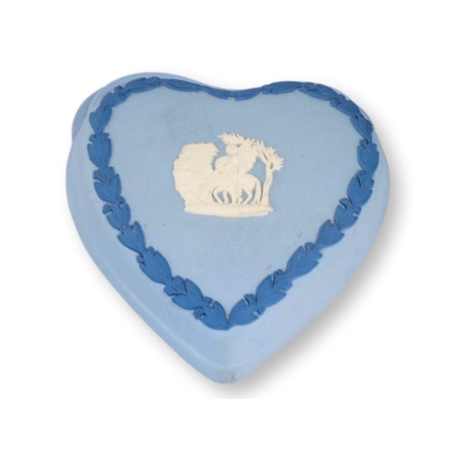 Beautifully detailed Wedgwood Jasperware set in classic blue and cream, featuring a rectangular tray and a heart-shaped...