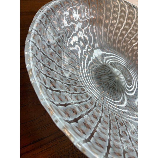 Fine Murano latticino bowl with thin white ribbons and gold accents. Beautiful centerpiece bowl. Measures 13” across....