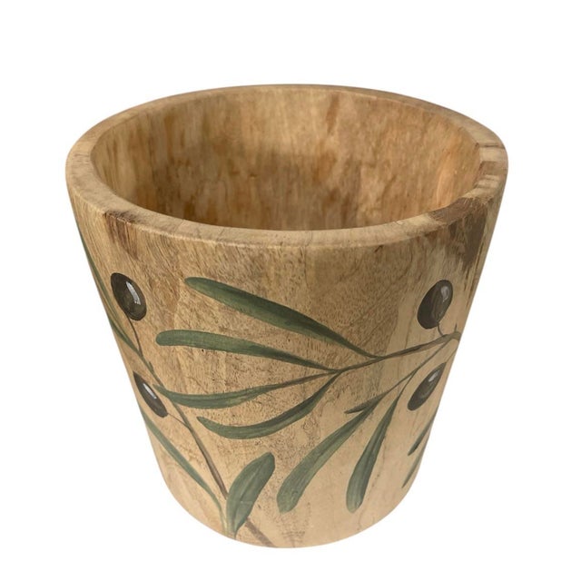 The manufacturer and specific wood species for this piece are unknown. Add a touch of Mediterranean warmth to your...