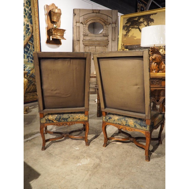More information coming soon… Hand-carved in the Regence style, this pair of French armchairs from the 1800s have...