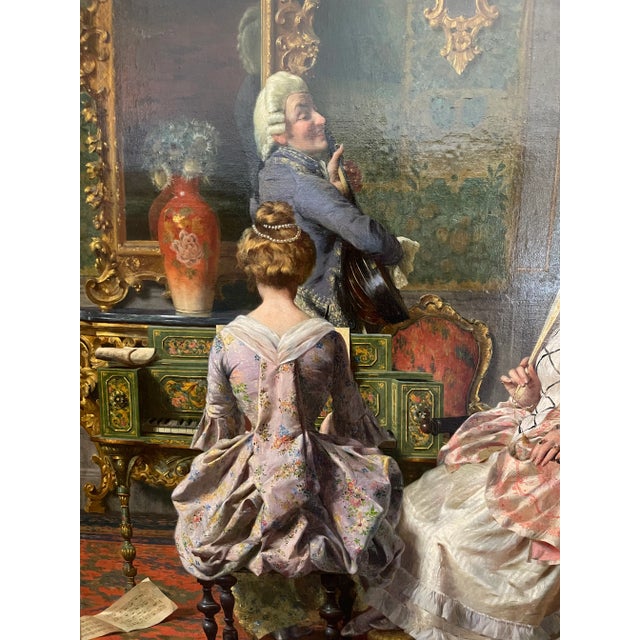 Oil on Canvas by Pompeo Massani (1850-1920) This painting depicts a scene of a musical interlude, featuring a man and two...