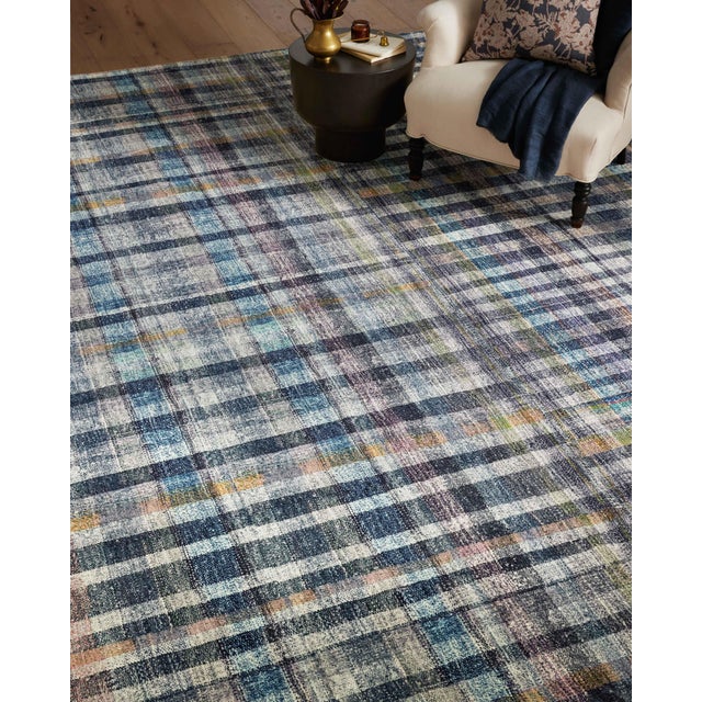 Area rugs in the Humphrey Collection for Chris Loves Julia x Loloi prove that stripes and plaid never go out of style in...