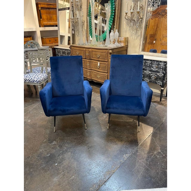 Fine pair of Italian Mid-Century Navy Gio Ponti style chairs upholstered in a plush velvet. A favorite of the designers....