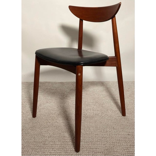 A pair of Danish modern dining chairs designed by Harry Østergaard for Randers Møbelfabrik, Denmark, circa 1960s. They...