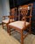 Pair of Chippendale style chairs in a beautiful lacquered finish the color of paprika and upholstered textured woven...