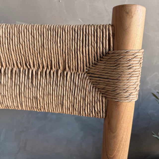 Enhance your indoor / outdoor dining experience with this stylish solid teak wood dining chair featuring natural rope...