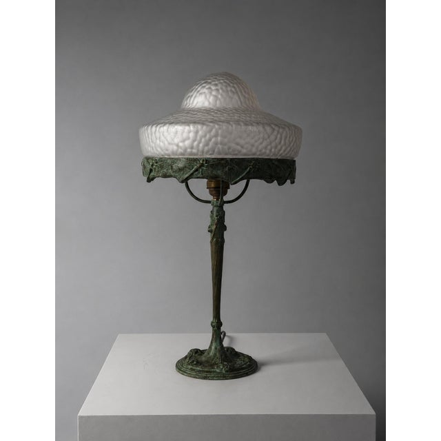 Alice Nordin for Böhlmarks, Model 6530, Sweden, 1912 An exceptional Swedish Art Nouveau table lamp designed by sculptor...