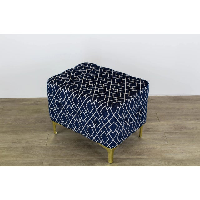 Elegant pair of custom design ottomans upholstered in a geometric blue and cream chenille textile, this beautiful pair of...