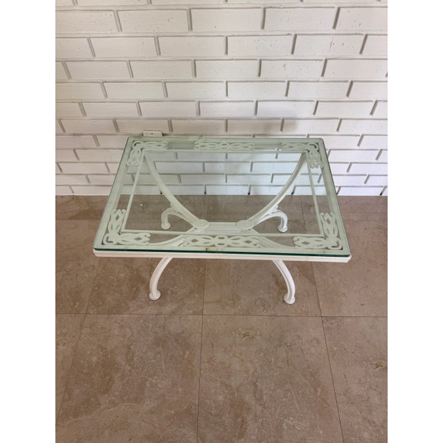 This charming vintage coffee or side table embodies classic 1970s design with a playful yet elegant twist. Crafted from...