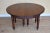 For sale is a good quality William IV oval dining table with a single additional leaf. Each end standing on three turned...