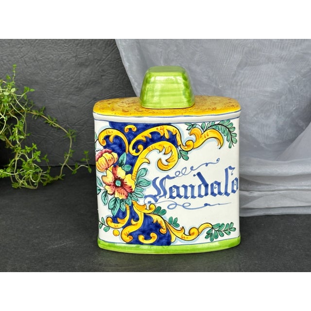 Made in the Tuscan hillside town of Montelupo Fiorentino, this vintage handmade Italian ceramic apothecary jar has a...