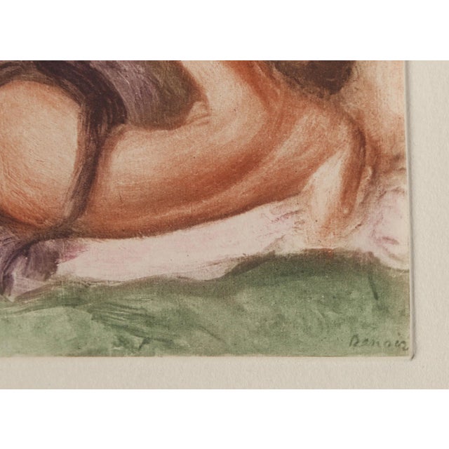 Punctuated by swiftly-applied lines, curvilinear forms, and vibrant pastel hues, Renoir's Impressionist etching of nude...