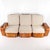 Rare rattan sofa by Paul Frankl from the 1970s. Comprising three modules upholstered in a beautiful heathered fabric, this...