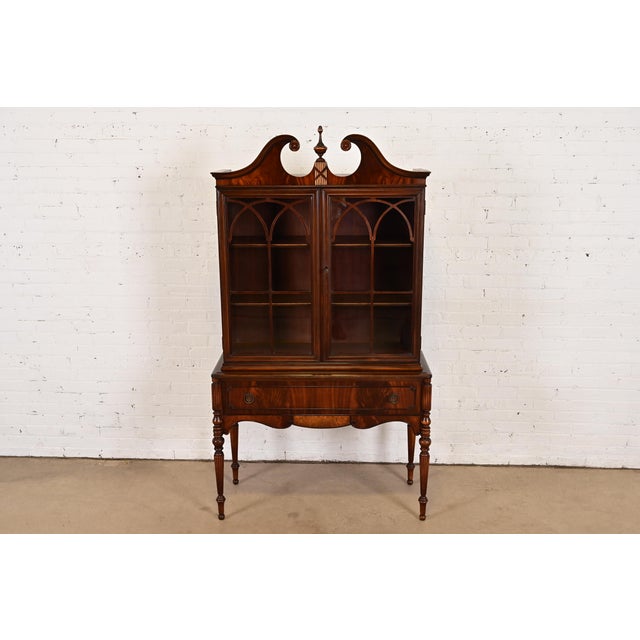An exceptional antique Georgian or Chippendale style bookcase, dining cabinet, or bar cabinet By Berkey & Gay USA, Circa...
