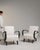 This pair of armchairs carries genuine presence, its cream upholstery, dark wood bentwood arms immediately setting the...