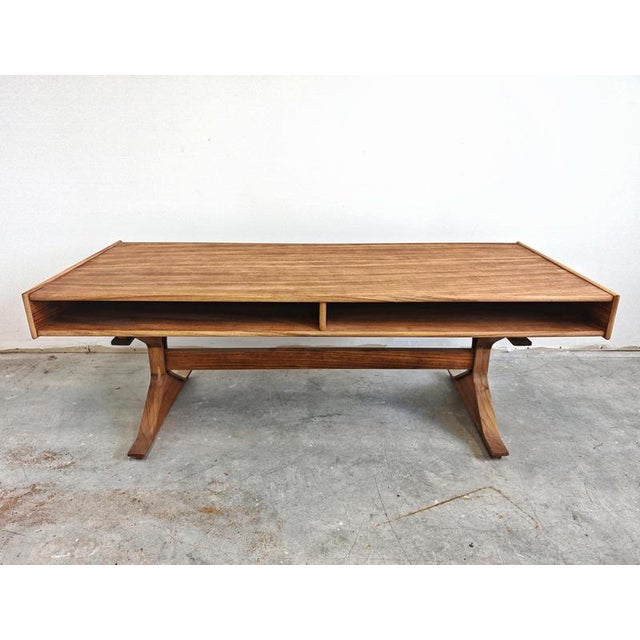 An exceptionally rare Mid Century Modern coffee table designed by Gianfranco Frattini for Bernini. The table is done in...