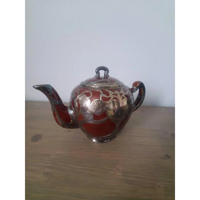 A superb early 20th century American Art Nouveau Lenox teapot. Fine quality, exceptionally executed, featuring beautiful...