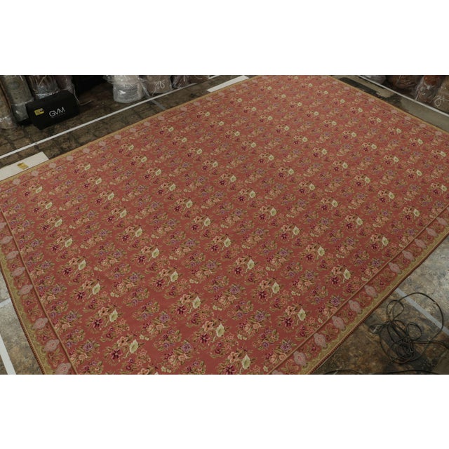 This vintage 12x18 needlepoint rug is a unique reimagining of antique English works of the same style. Handmade in wool...