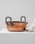 This 19th-century Belgian copper pot exemplifies traditional European metalwork with its hand-hammered surface and aged...