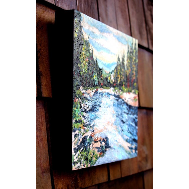 This artwork captures the serene flow of the Wenatchee River, surrounded by lush greenery and distant mountains. The...