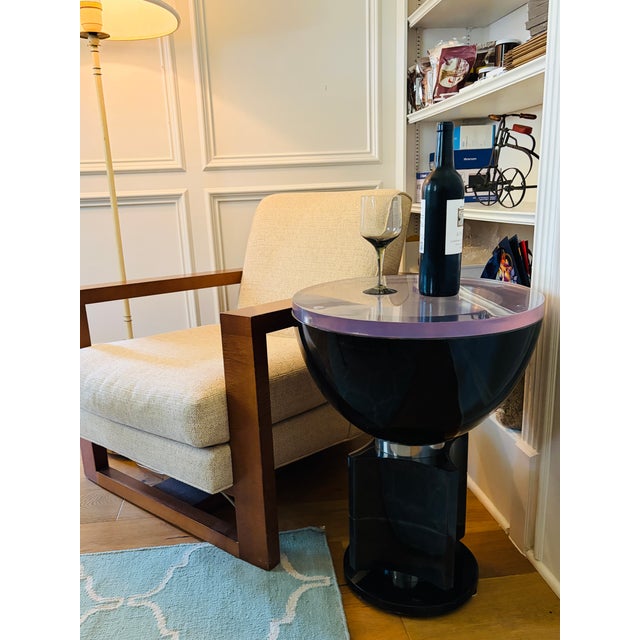 A spectacular Elba Side Table by Sylvan S.F., an extraordinary sculptural design combining hand-dyed parchment goatskin,...