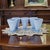 This set of five footed juice tumblers was produced by Jeanette Glass in the Cherry Blossom pattern, a Depression-era...