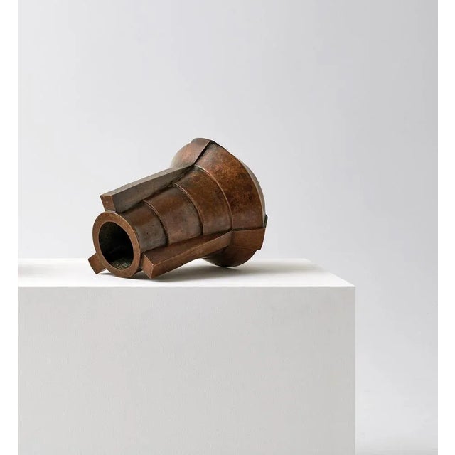 Bronze vase by Lupo Horio¯kami Dimensions: Diameter 20 x Height 30 cm Materials: Bronze fair acid “The artwork [\.] arises...