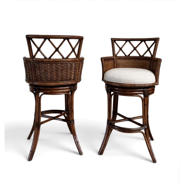Add a touch of relaxed luxury and island-inspired elegance to your home with this beautifully crafted pair of Tommy Bahama...