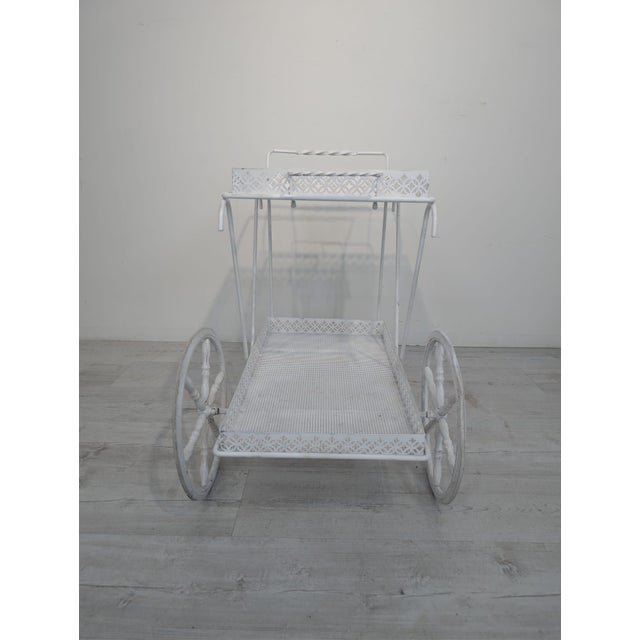 Mobile Bar Table/Serving Cart, White This white metal bar table on wheels is perfect for serving drinks or snacks. It...