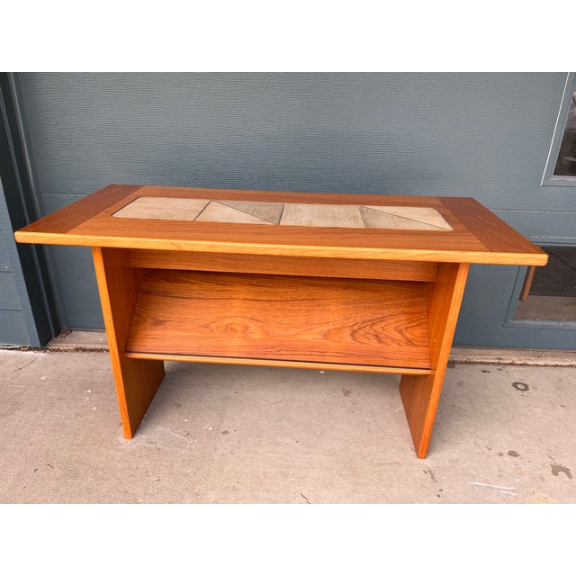 A beautifully proportioned Danish Modern console table by Gangsø Møbler, confirmed by the original Gangsø "Made in...