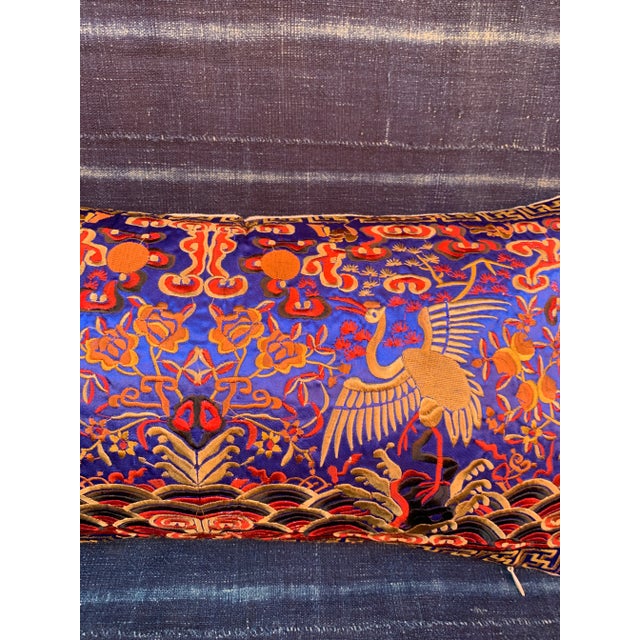 Boudoir lumbar pillow made of a vintage colorful embroidered silk Asian textile fragment from a Chinese Opera Robe. A...