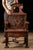 An exceptional Victorian open-back armchair constructed from mahogany and dated 1880. Its tall, architectural profile is...