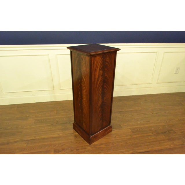 This is made-to-order traditional mahogany display pedestal made in the Leighton Hall shop. It’s four sides feature swirly...