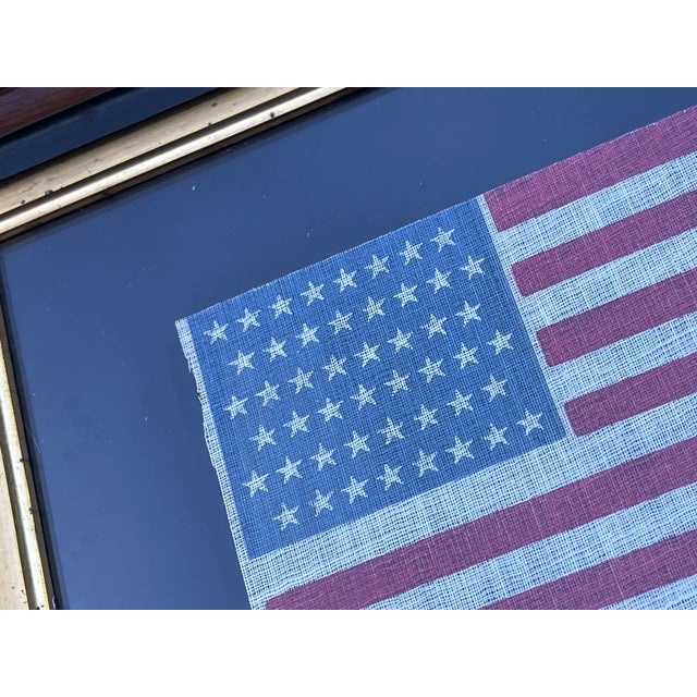 A gorgeous and rare flag. 110 years old. Nicely preserved in this 100 year old walnut and gold leaf frame. Flag is about...