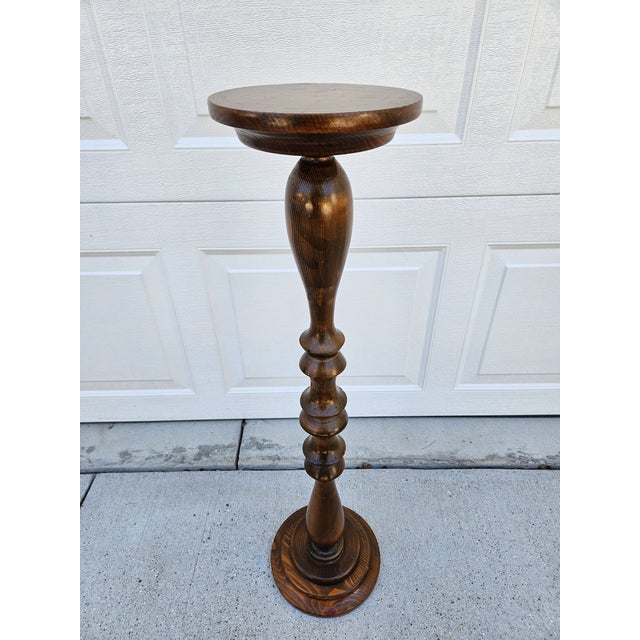 A unique pedestal candle or small plant stand. This classic piece could be used as a candle stand or for small plants. It...