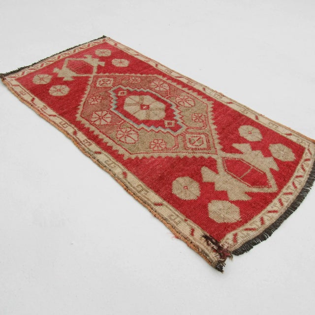 Vintage handknotted decorative mini rug from Konya region of Turkey. Approximately 50-60 years old. In very good...