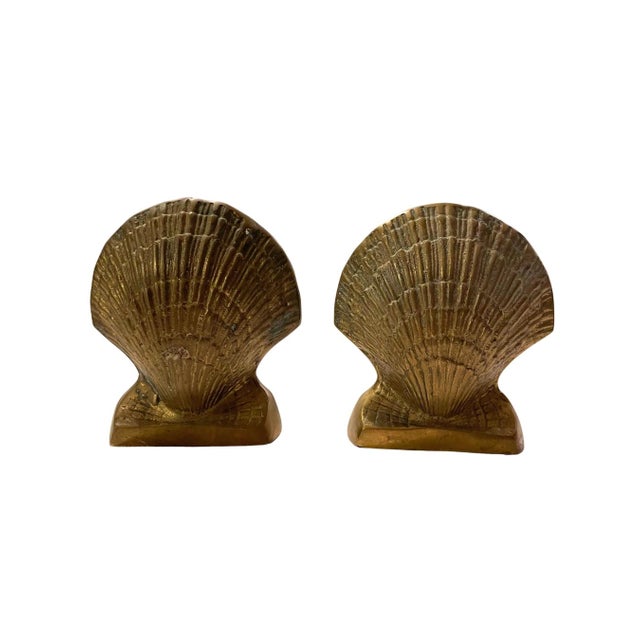 Vintage brass clam shell bookends with a sculptural coastal feel. These substantial, heavy bookends feature deeply...