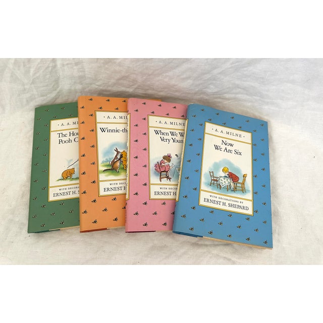 Vintage set of 4 "Winnie the pooh" books from 1955 A. A. Milne, perfect for a children's room or staging purposes. 7.5in h...