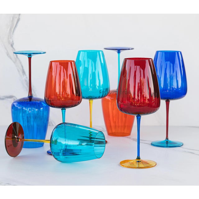 Bold and confident, the Pompidou Aqua Wine Glass is characterized by an array of vibrant colors within each piece. Mix and...