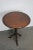 Lovely mahogany wine table from the 18th century. This table features a solid mahogany tilt top on tripod legs. The table...