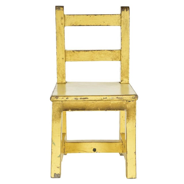 with its simple lines and bright patina, this children's chair evokes both the tenderness of childhood and the...