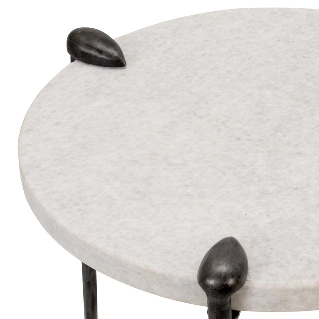 Iron side table with raw steel finish and a natural white marble top