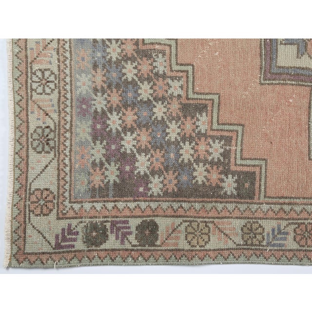 Peach Vintage Tribal Turkish Rug in Soft Peach & Neutrals - Boho Turkish Medallion Rug With Graphic Borders -4' 3'' X 8' 5'' For Sale - Image 8 of 9