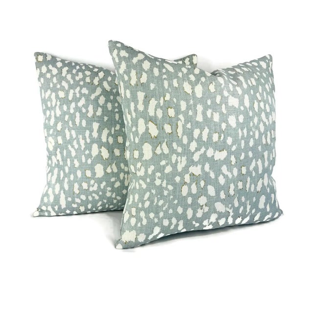 From the exclusive Jan Showers Charmant collection for Kravet. Elevate your décor with the LYNX DOT in Ciel pillow cover....