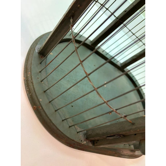 Vintage Olive Green Wood and Wire Birdcage With Dome Top This vintage wood and metal birdcage features a domed wire top, a...