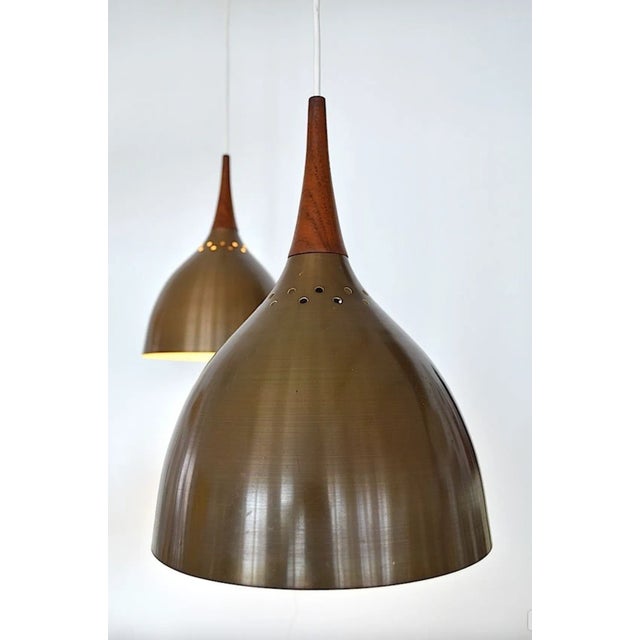 Scandinavian pendant lamp from the 1960s in the Fog & Mørup style. - The lampshade is made of copper - The inside of the...