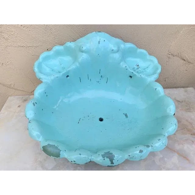 Antique french hanging wall cast iron Lavabo, sink and water container. The lavabo holds and dispenses water and began use...